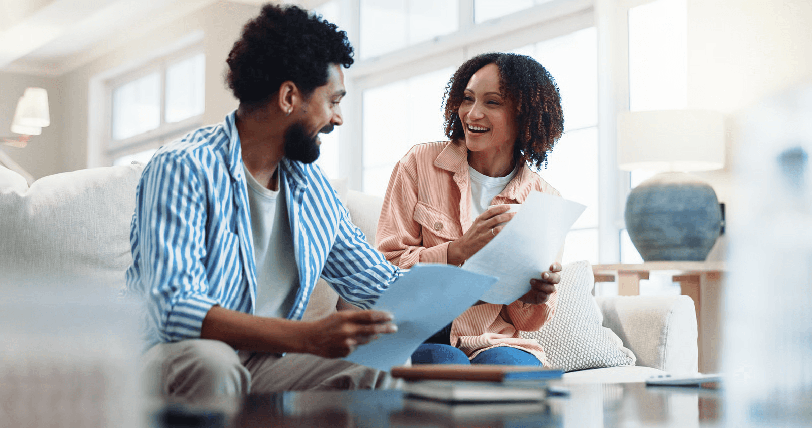 A couple reviewing their loan documents together